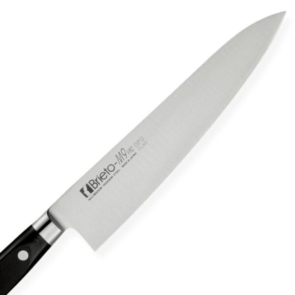 A chef knife focusing on its blade, shown diagonally