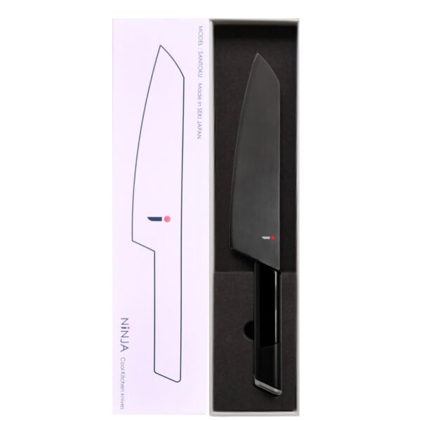 An all purpose knife displayed in a black box