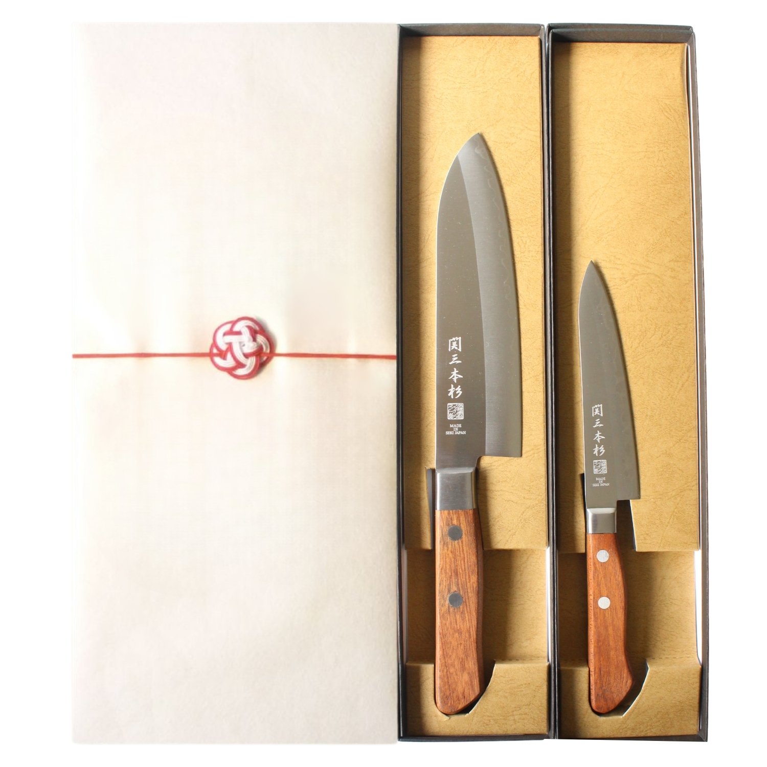All-purpose and petty knives in gift boxes, wrapped with paper and a ribbon