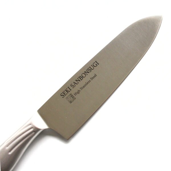 An all purpose knife focusing on its blade, shown diagonally