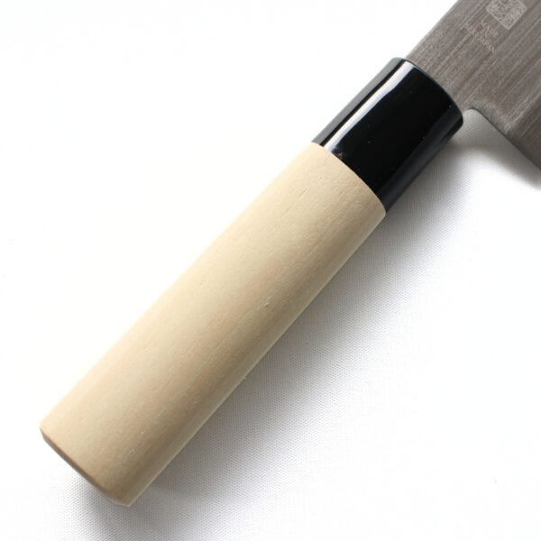 A kitchen knife focusing on its wooden handle