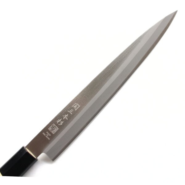 A sashimi knife focusing on its blade, shown diagonally