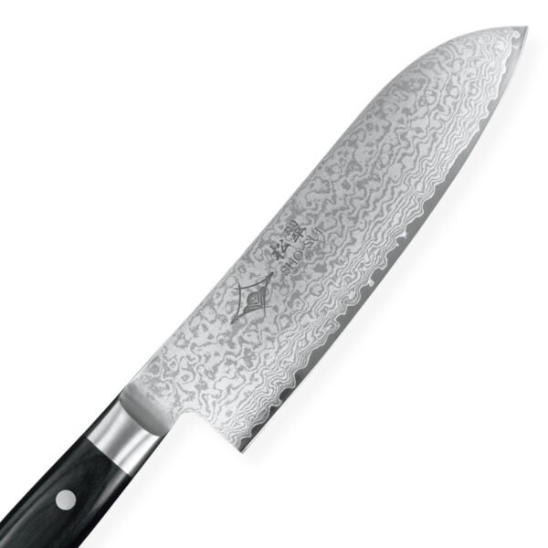 A Damascus all purpose knife focusing on its blade, shown diagonally