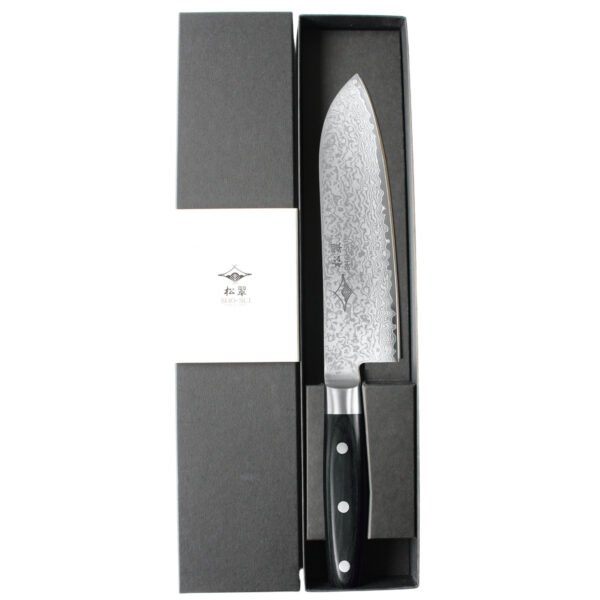A Damascus all purpose knife displayed in a black box