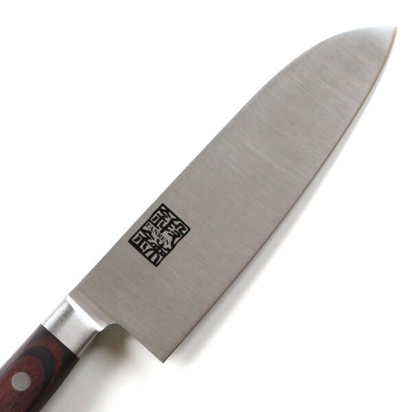 An all purpose knife focusing on its blade, shown diagonally
