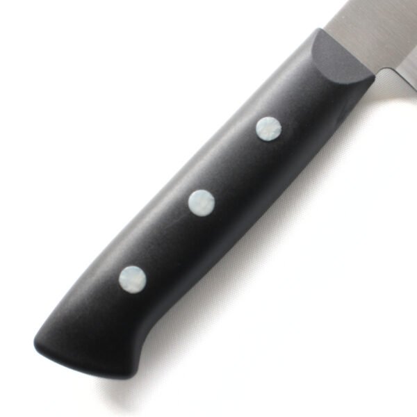 A kitchen knife focusing on its POM handle