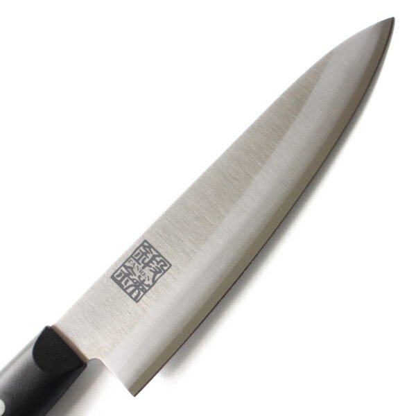 A chef knife focusing on its blade, shown diagonally