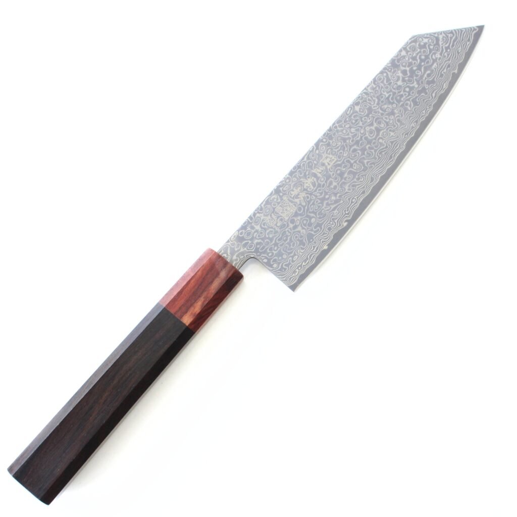 seki_sanbonsugi_damascus_all_purpose_all A Damascus purpose knife displayed diagonally, showing the entire knife