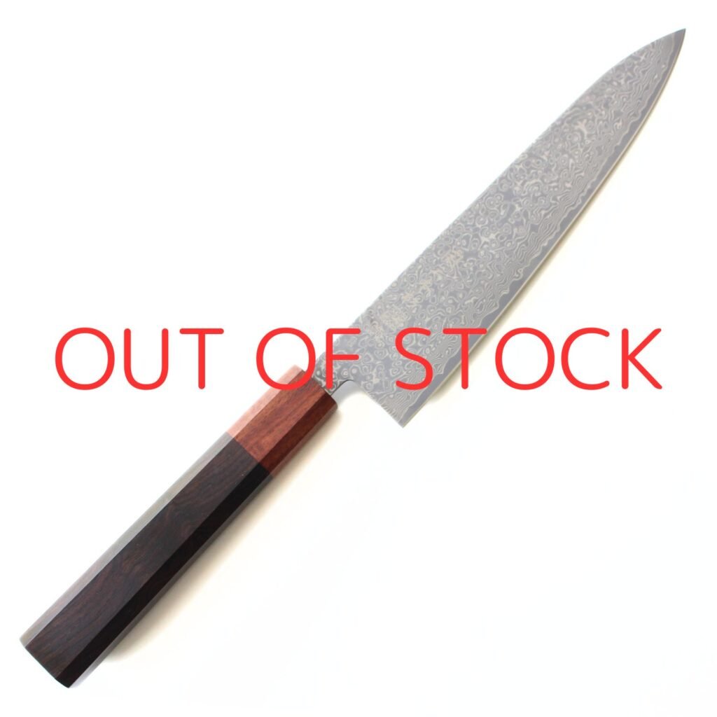 seki_sanbonsugi_damascus_chef_out_of_stock (1) A Damascus chef knife displayed diagonally, showing the entire knife with text of out of stock