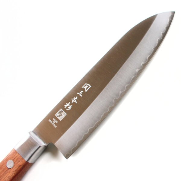 An all purpose knife focusing on its blade, shown diagonally