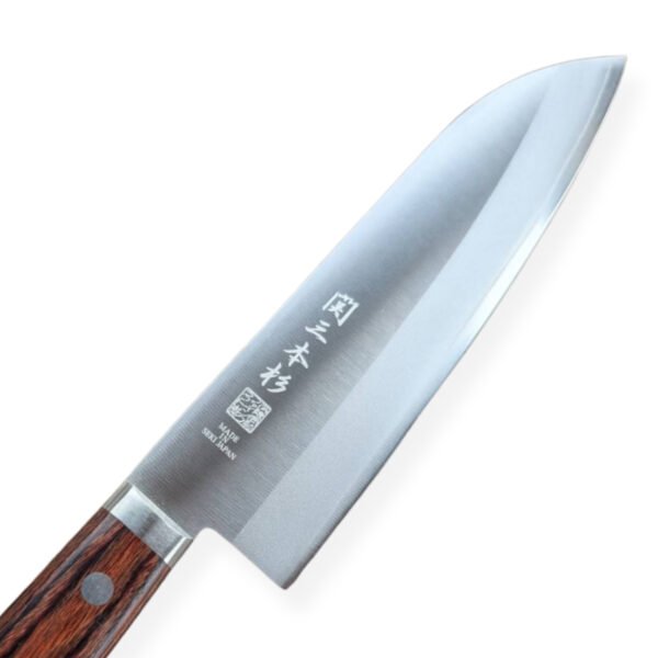An all purpose knife focusing on its blade, shown diagonally