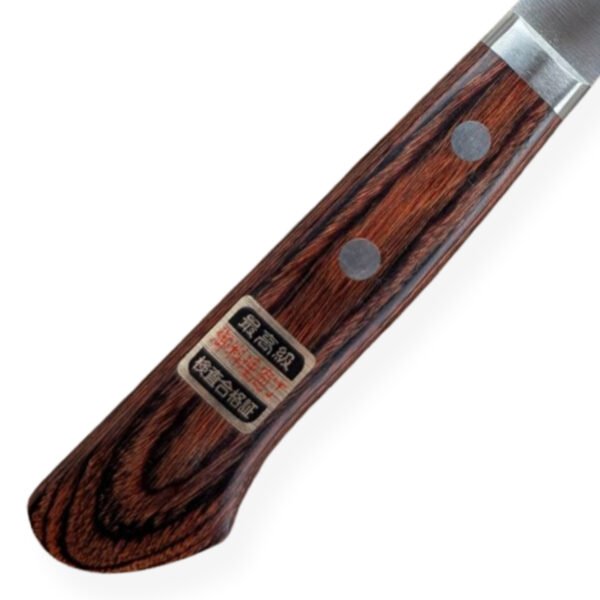 A kitchen knife focusing on its wooden handle