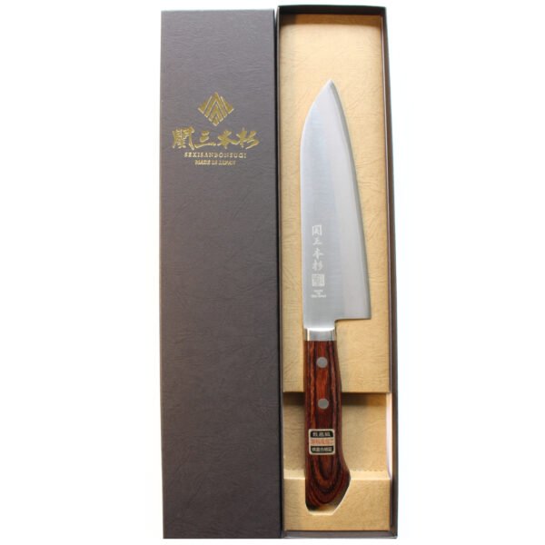 An all purpose knife displayed in a black box
