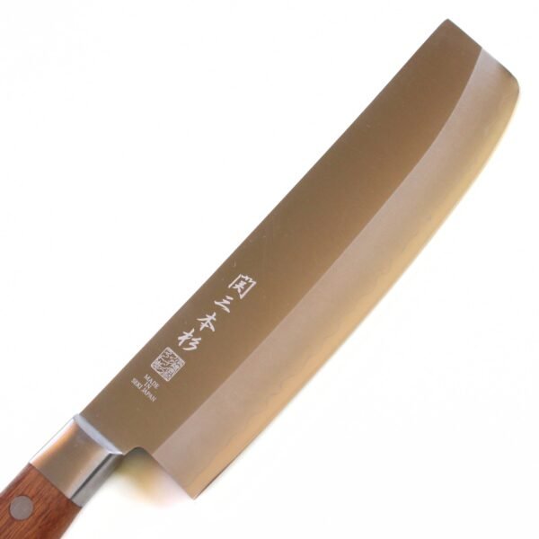 A vegetable knife focusing on its blade, shown diagonally