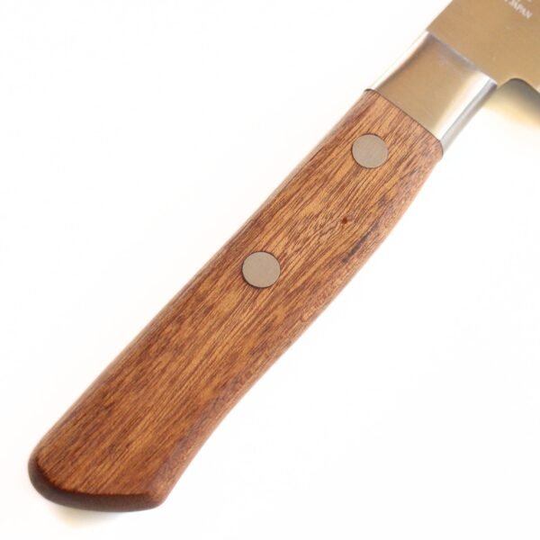 A kitchen knife focusing on its wooden handle