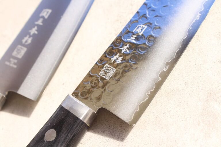 Close-up of a hammered-pattern Japanese kitchen knife