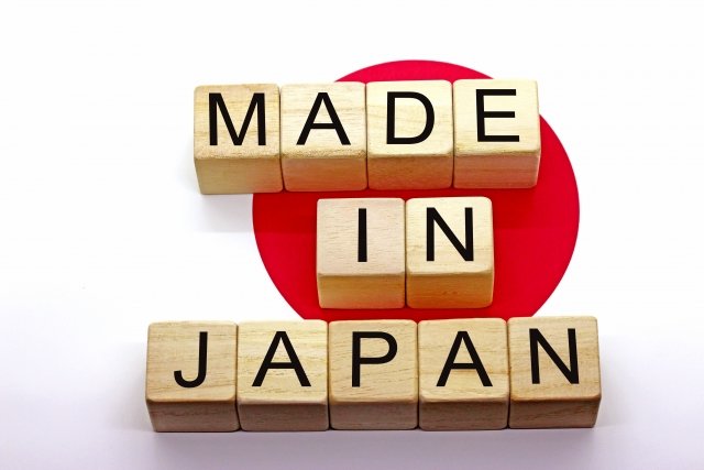Made in japan blocks against Japanese flag