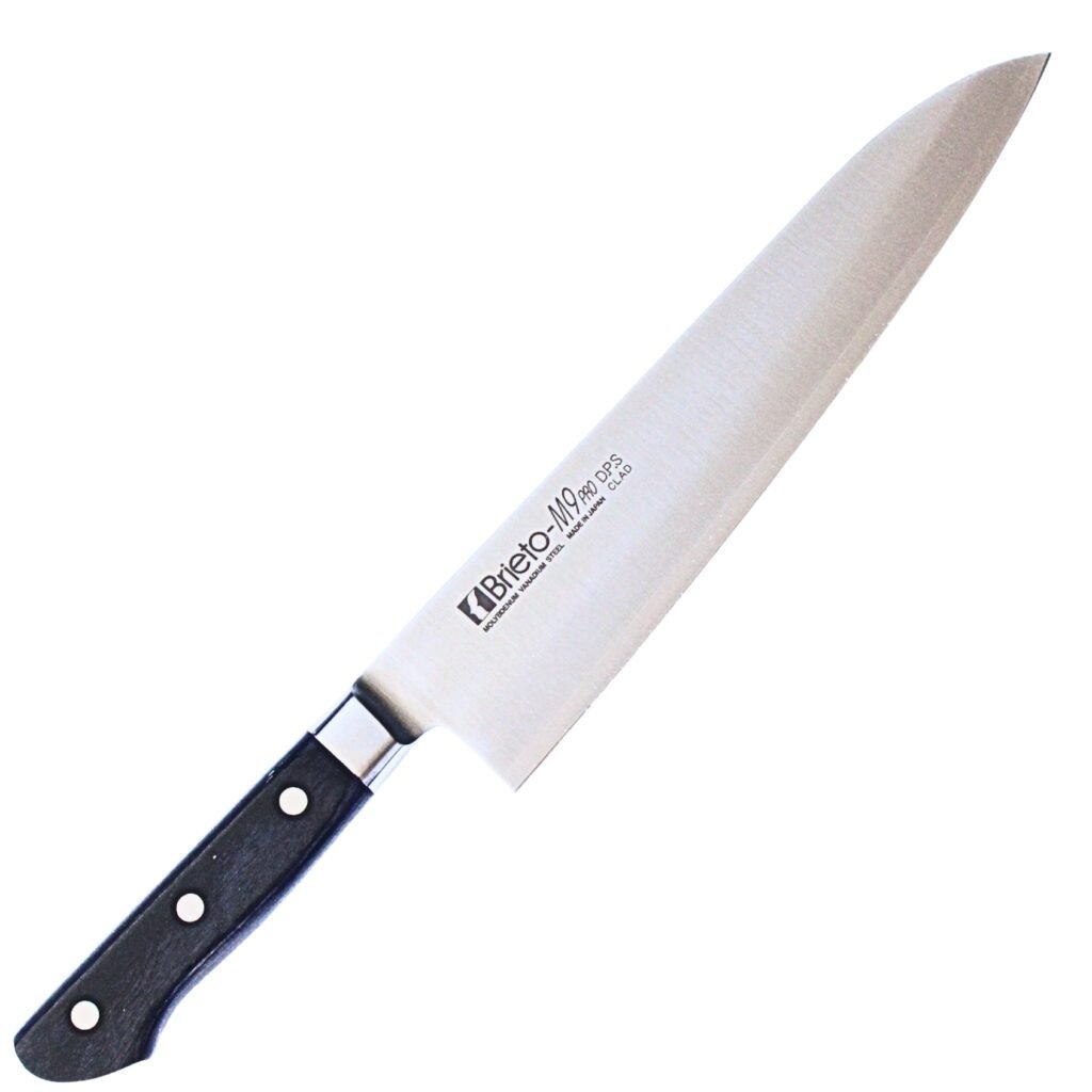 brieto_m9_chef_24cm_all A chef knife displayed diagonally, showing the entire knife
