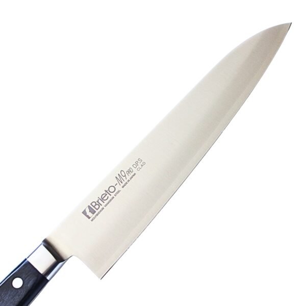 A chef knife focusing on its blade, shown diagonally