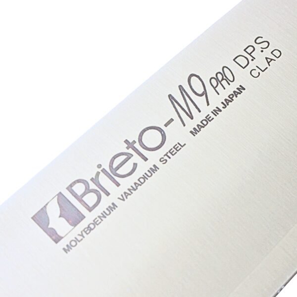 A kitchen knife focusing on its logo on the blade