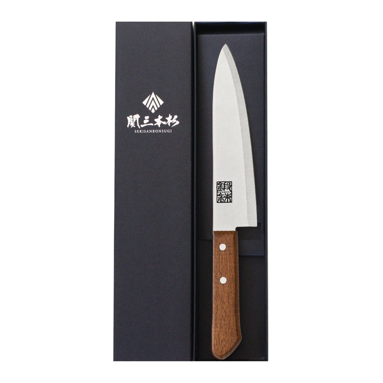A chef's knife displayed in a box
