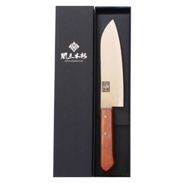 An all purpose knife displayed in a black box