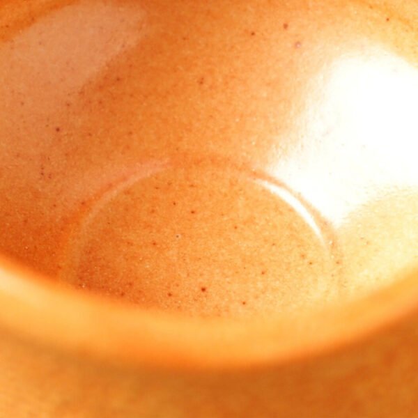 Close-up view of the matcha bowl's surface, showing its glaze and texture.