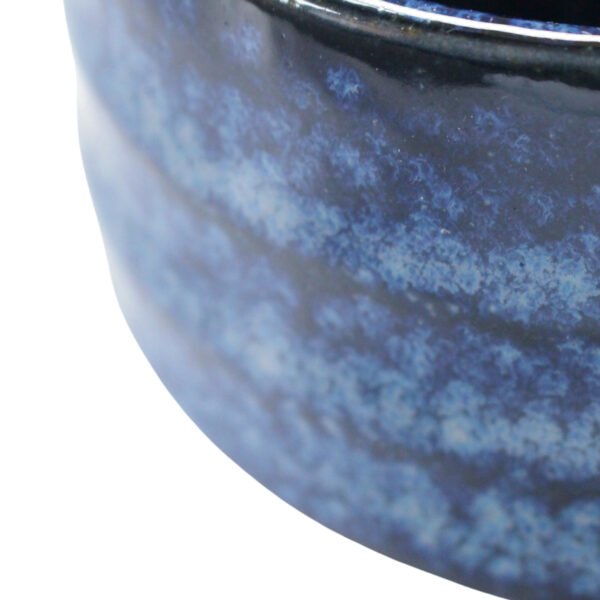 Close-up view of the matcha bowl's surface, showing its glaze and texture.