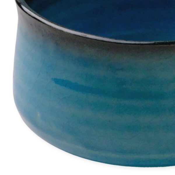 Close-up view of the matcha bowl's surface, showing its glaze and texture.