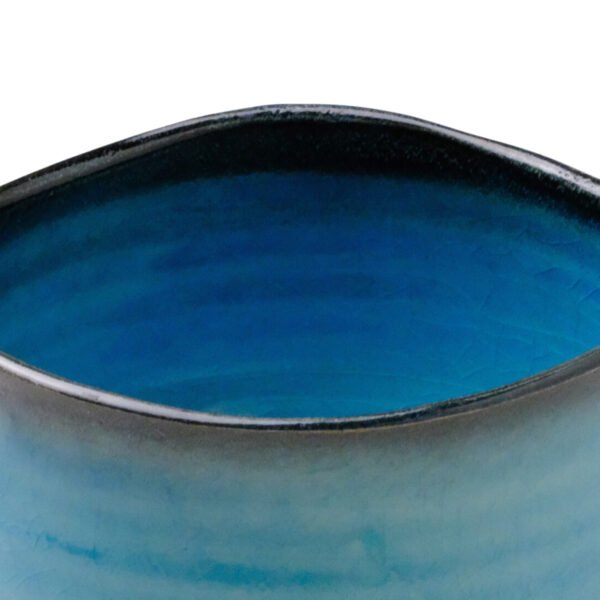 Close-up view of the matcha bowl's surface, showing its glaze and texture.