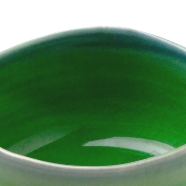 Close-up view of the matcha bowl's surface, showing its glaze and texture.