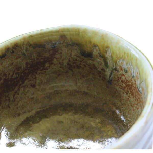 Close-up view of the matcha bowl's surface, showing its glaze and texture.