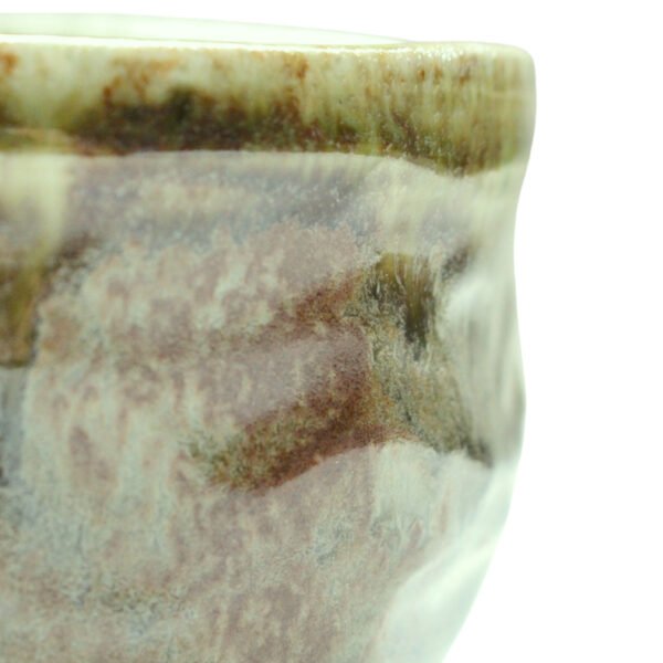 Close-up view of the matcha bowl's surface, showing its glaze and texture.