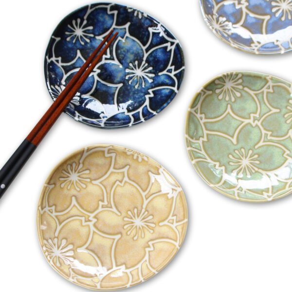 Image of five small plates with chopsticks
