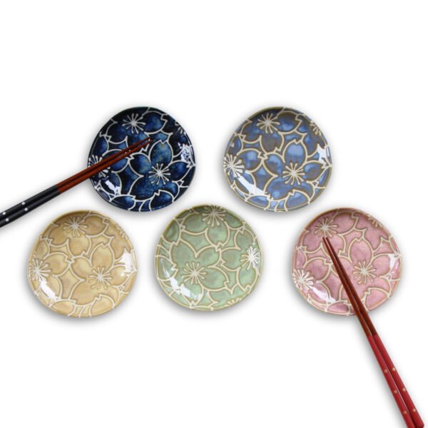 Image of five small plates with chopsticks
