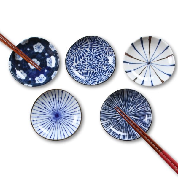 Image of five small plates with chopsticks