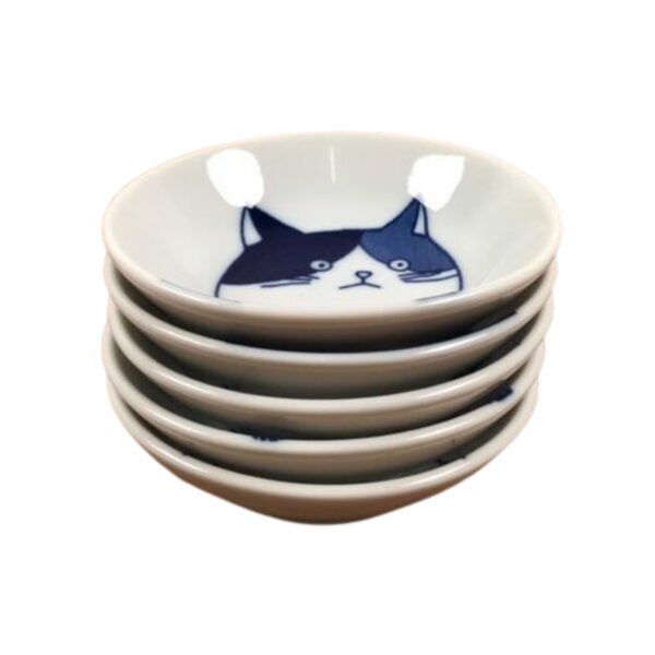 Stacked view of five small plates