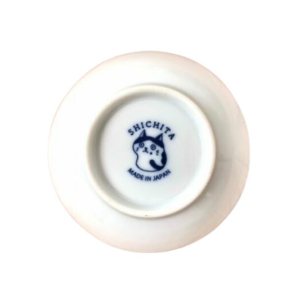 Photo of the back of a small plate showing "Made in Japan" text