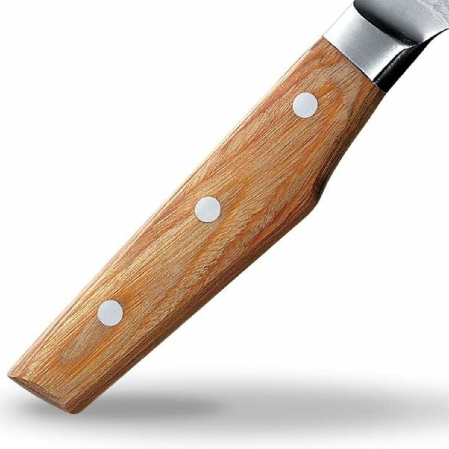 A kitchen knife focusing on its laminated wooden handle