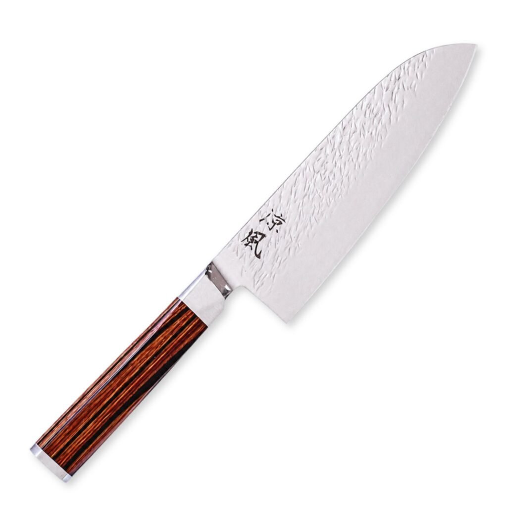 A Damascus all-purpose knife displayed diagonally, showing the entire knife