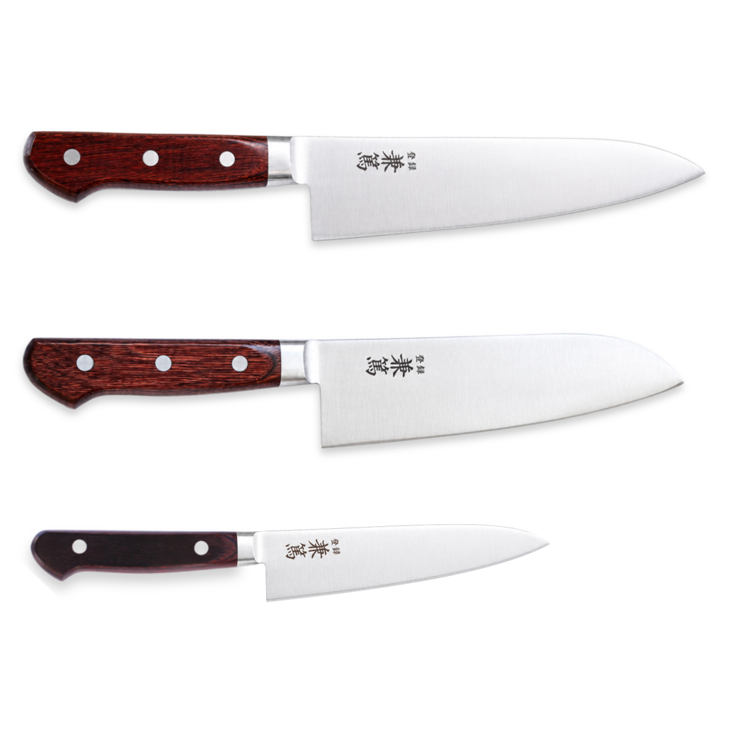 A chef's knife, an all-purpose knife, and a petty knife displayed horizontally in full