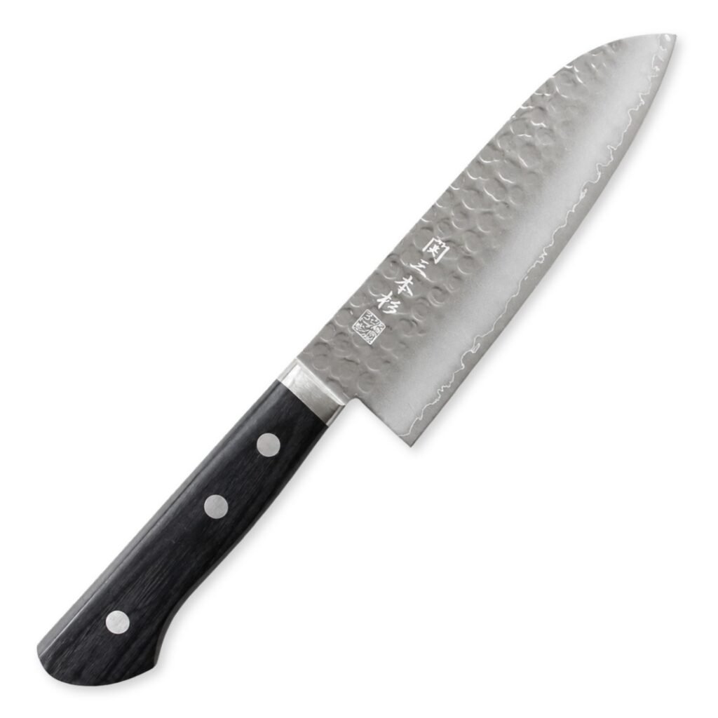 A hammered all purpose knife displayed diagonally, showing the entire knife